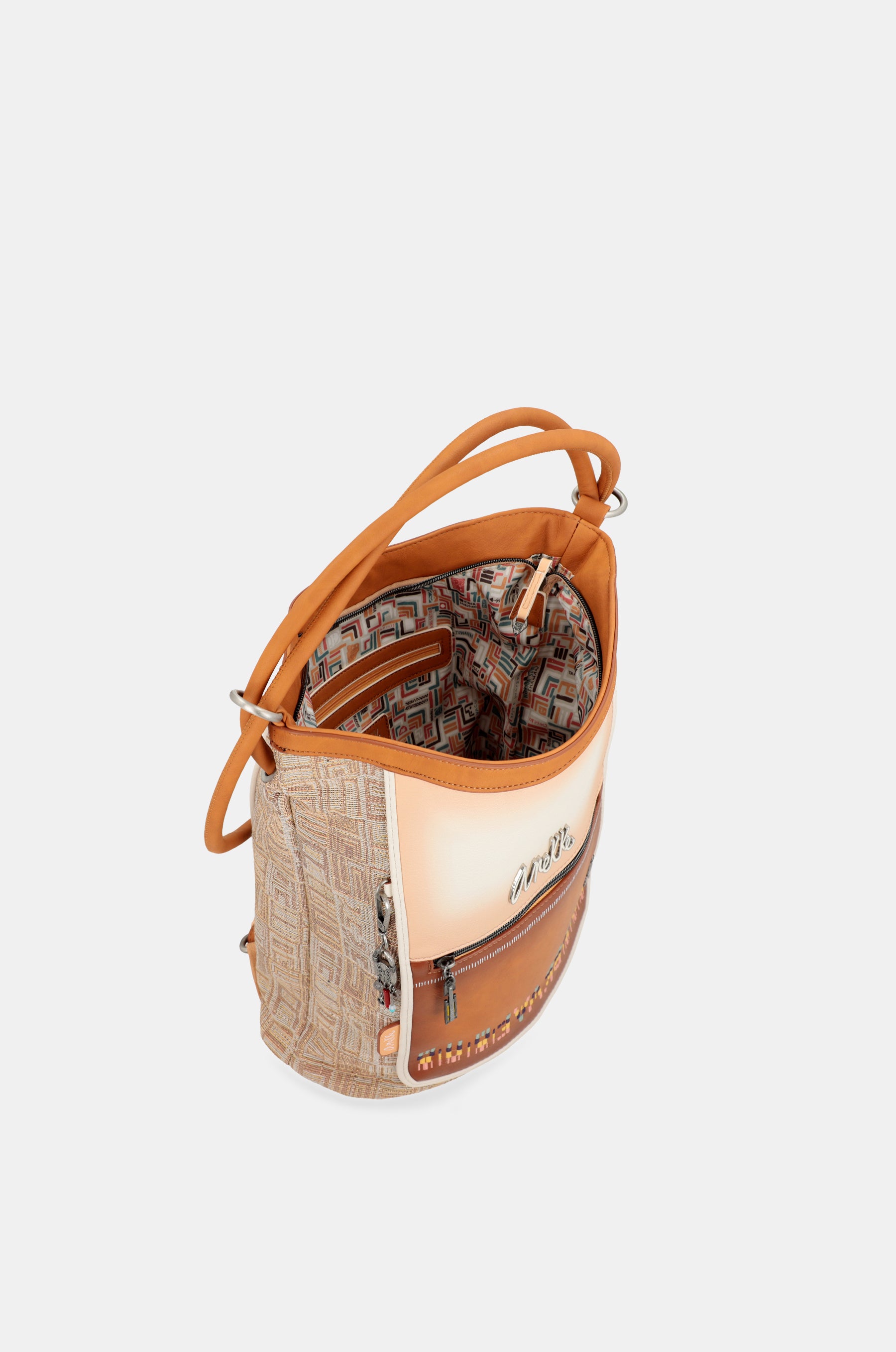 Magic Souls Convertible Crossbody Bag en un sac à dos de Magic Souls