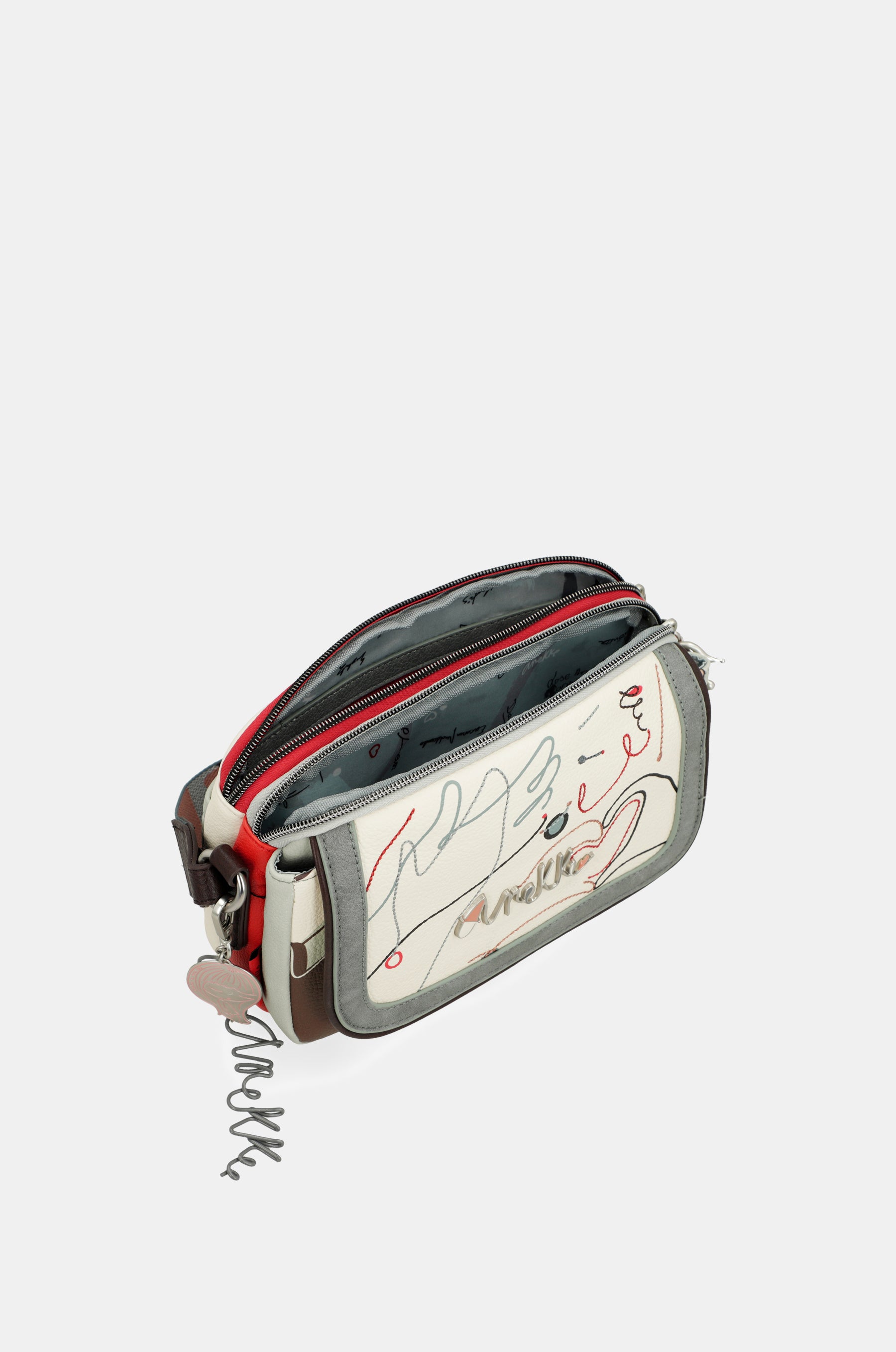 Sac bandoulière à rabat ovale Alma