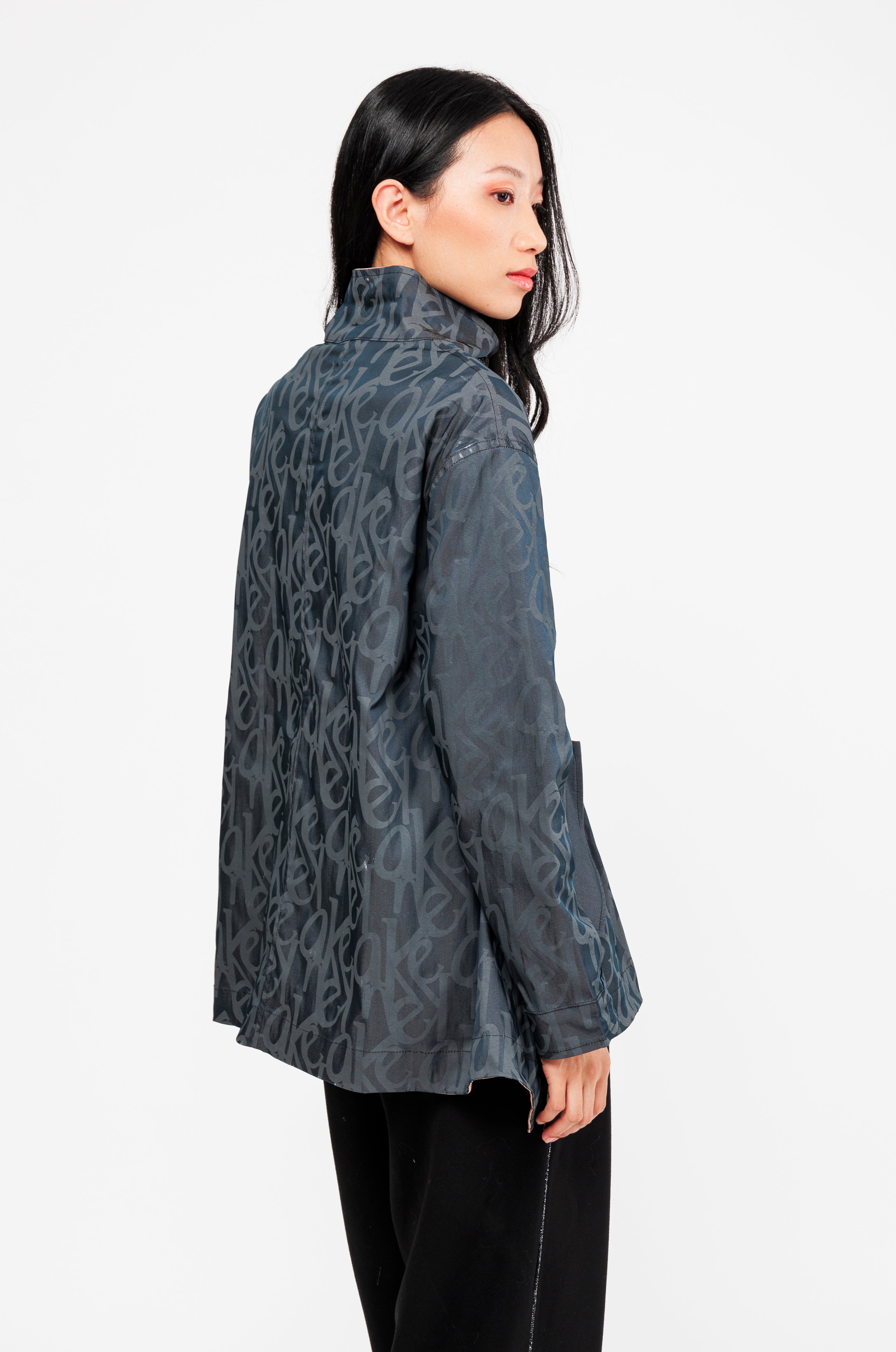 Veste réversible noir et beige