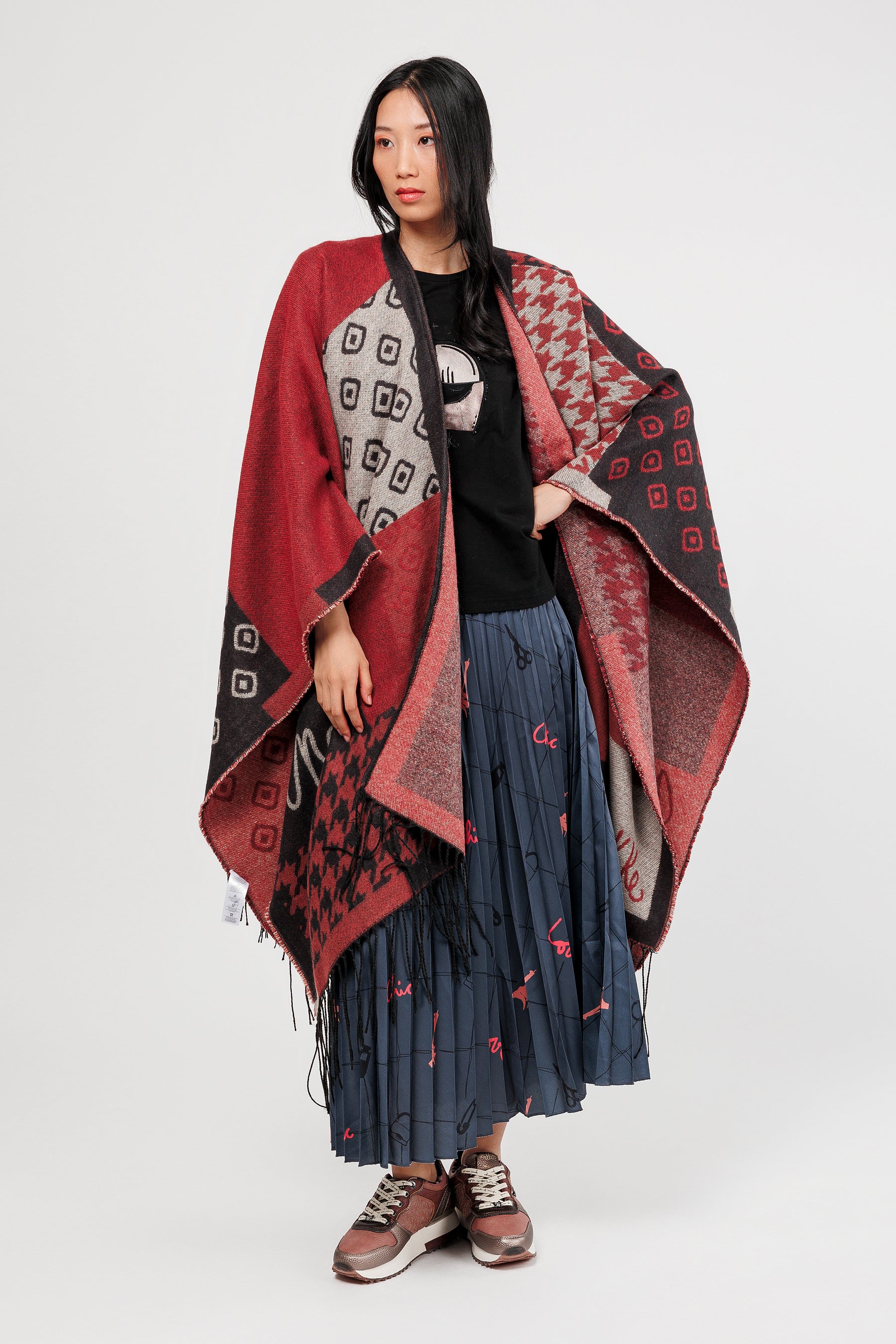 Poncho à franges bleu, bordeaux et beige