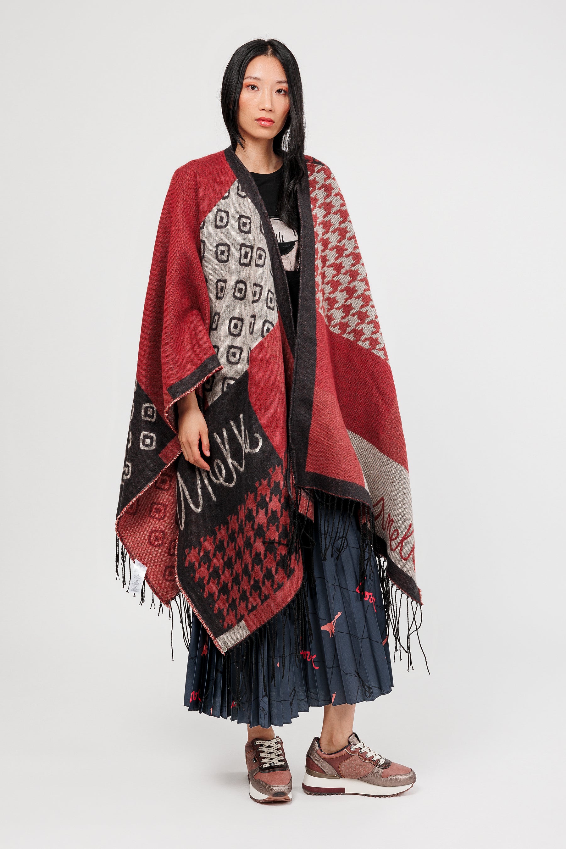 Poncho à franges bleu, bordeaux et beige