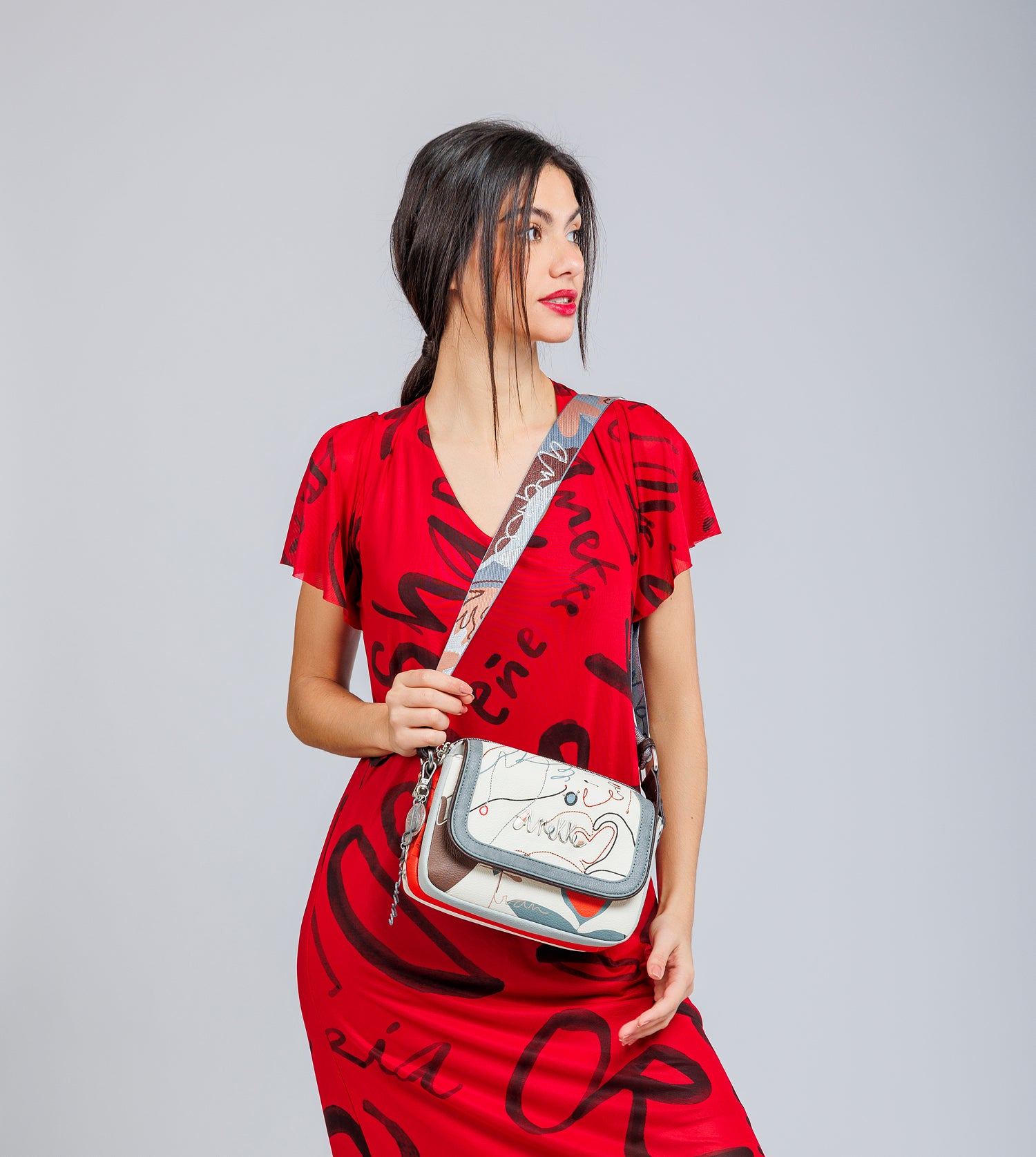 Sac bandoulière à rabat ovale Alma