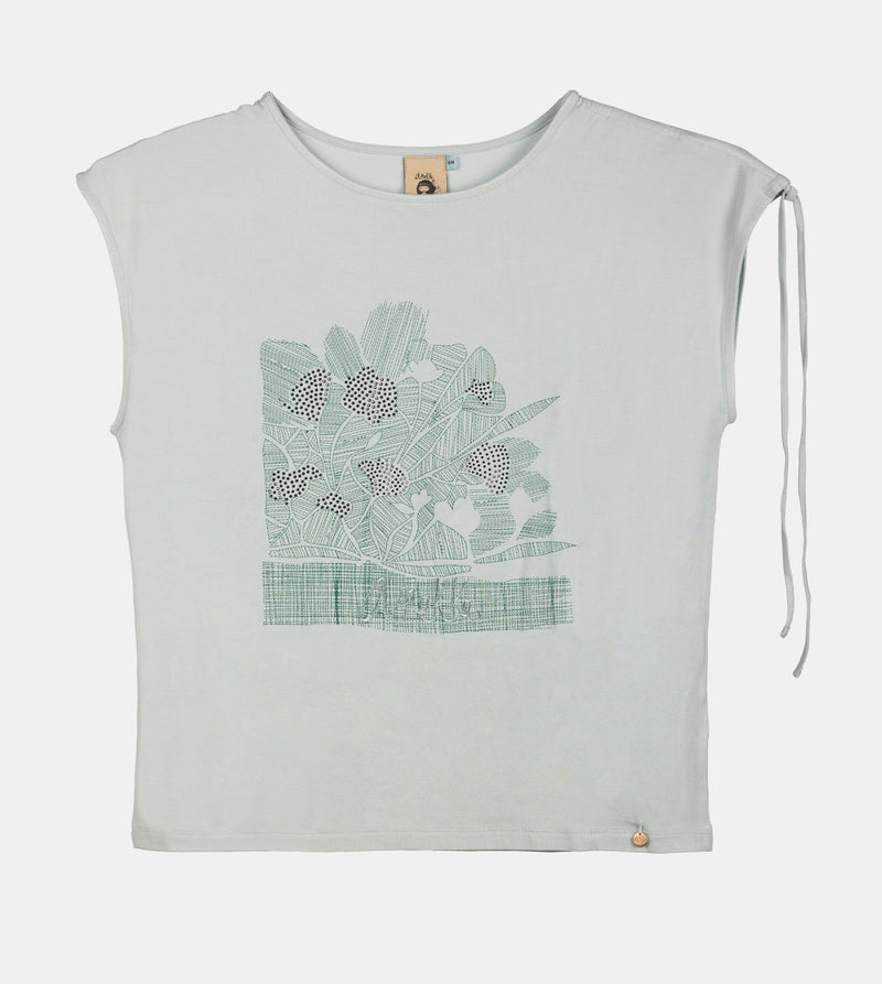 T-shirt bleu froncé sur une épaule