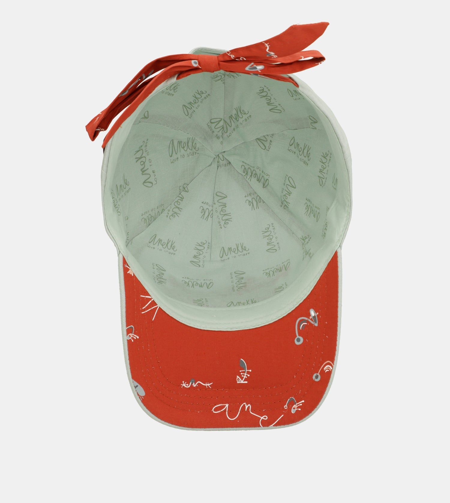 Casquette verte avec nœud rouge