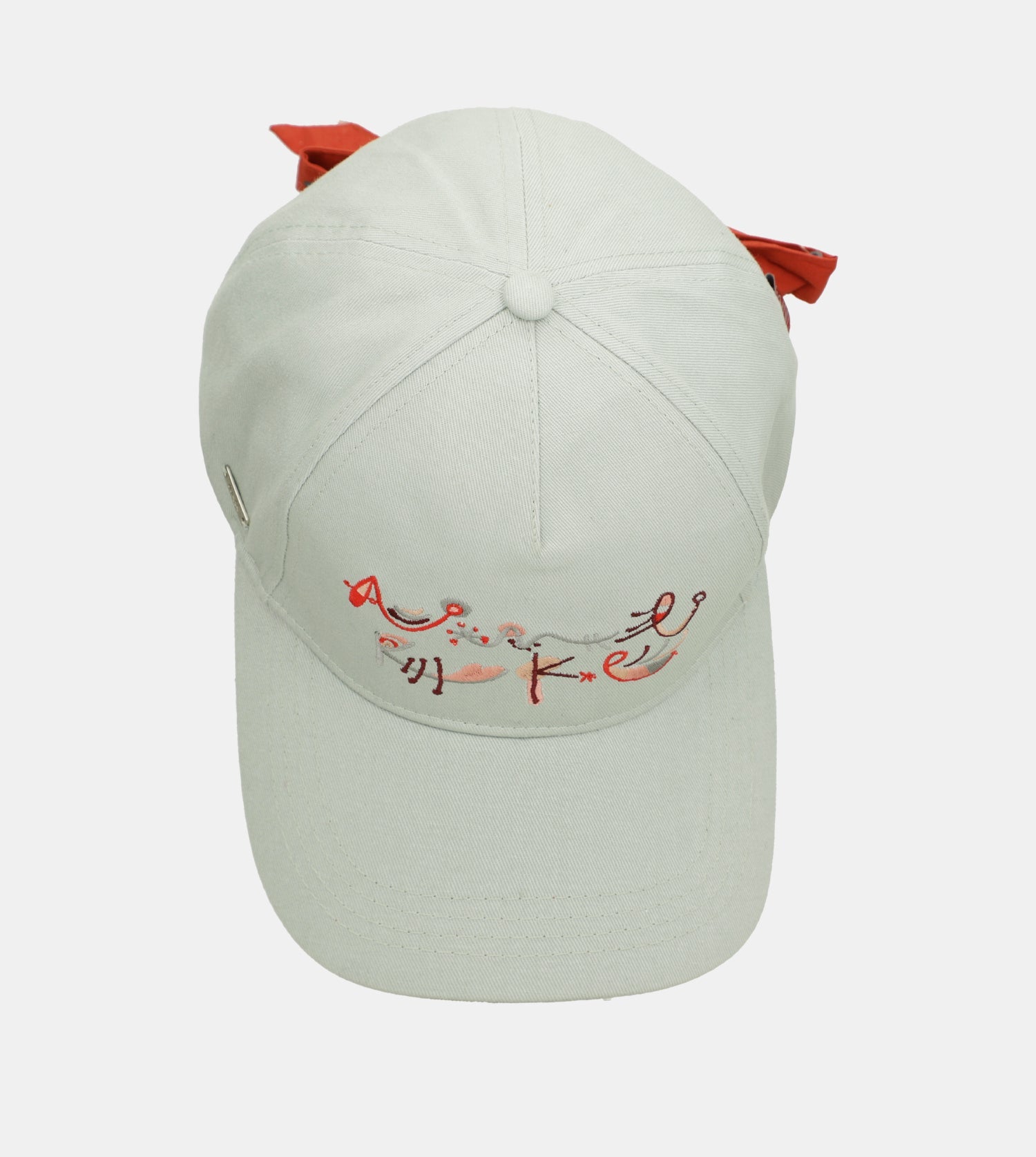 Casquette verte avec nœud rouge