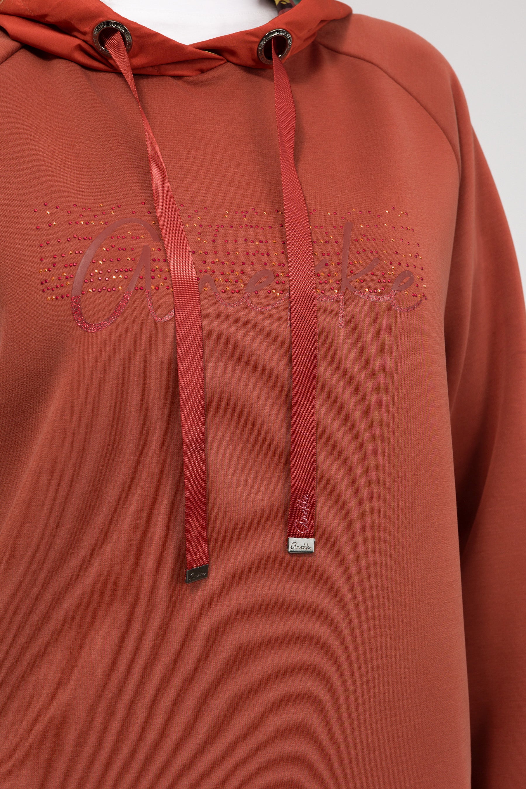 Sweat à manches longues et capuche