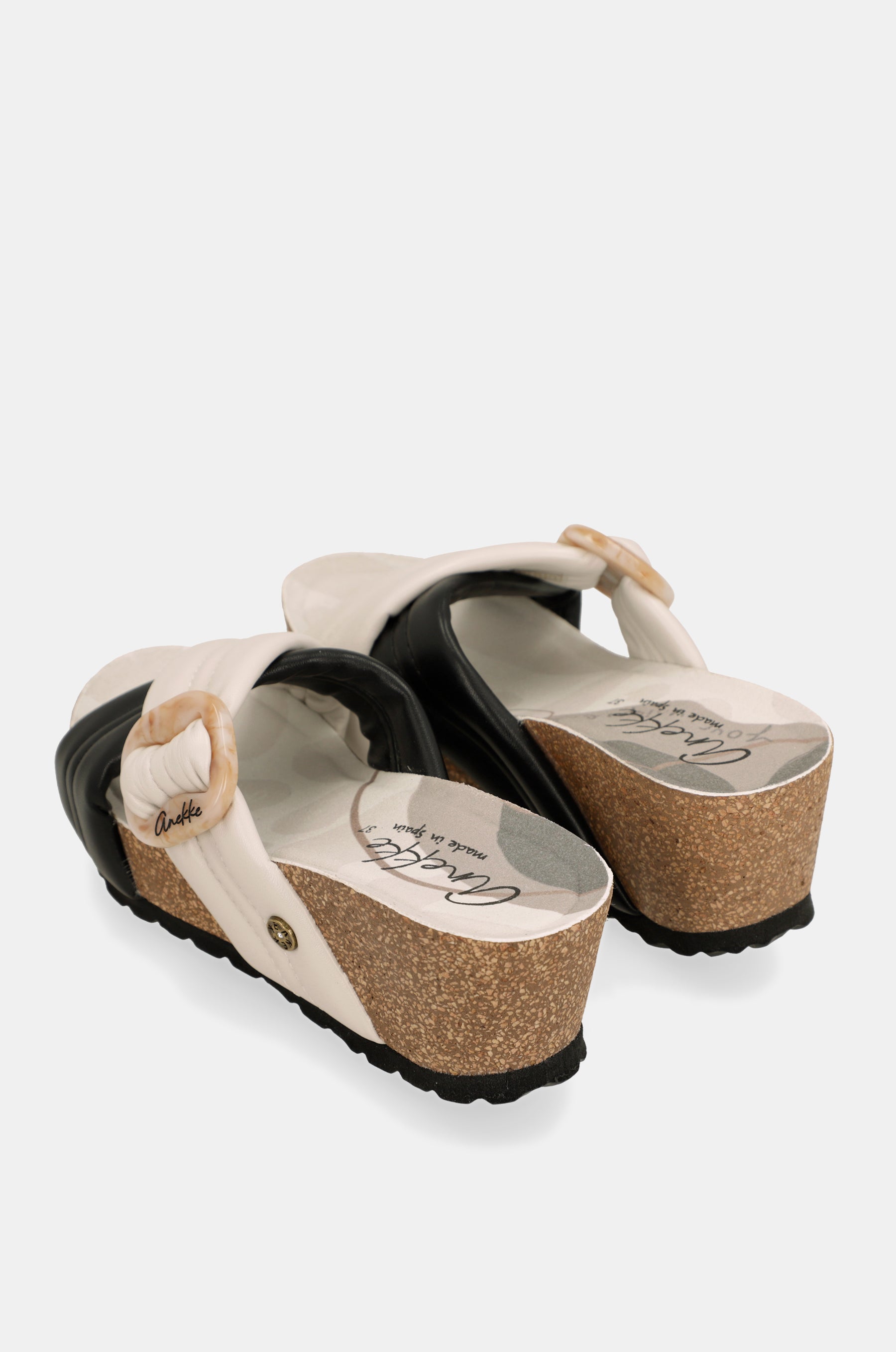 Sandales croisées noires et blanches