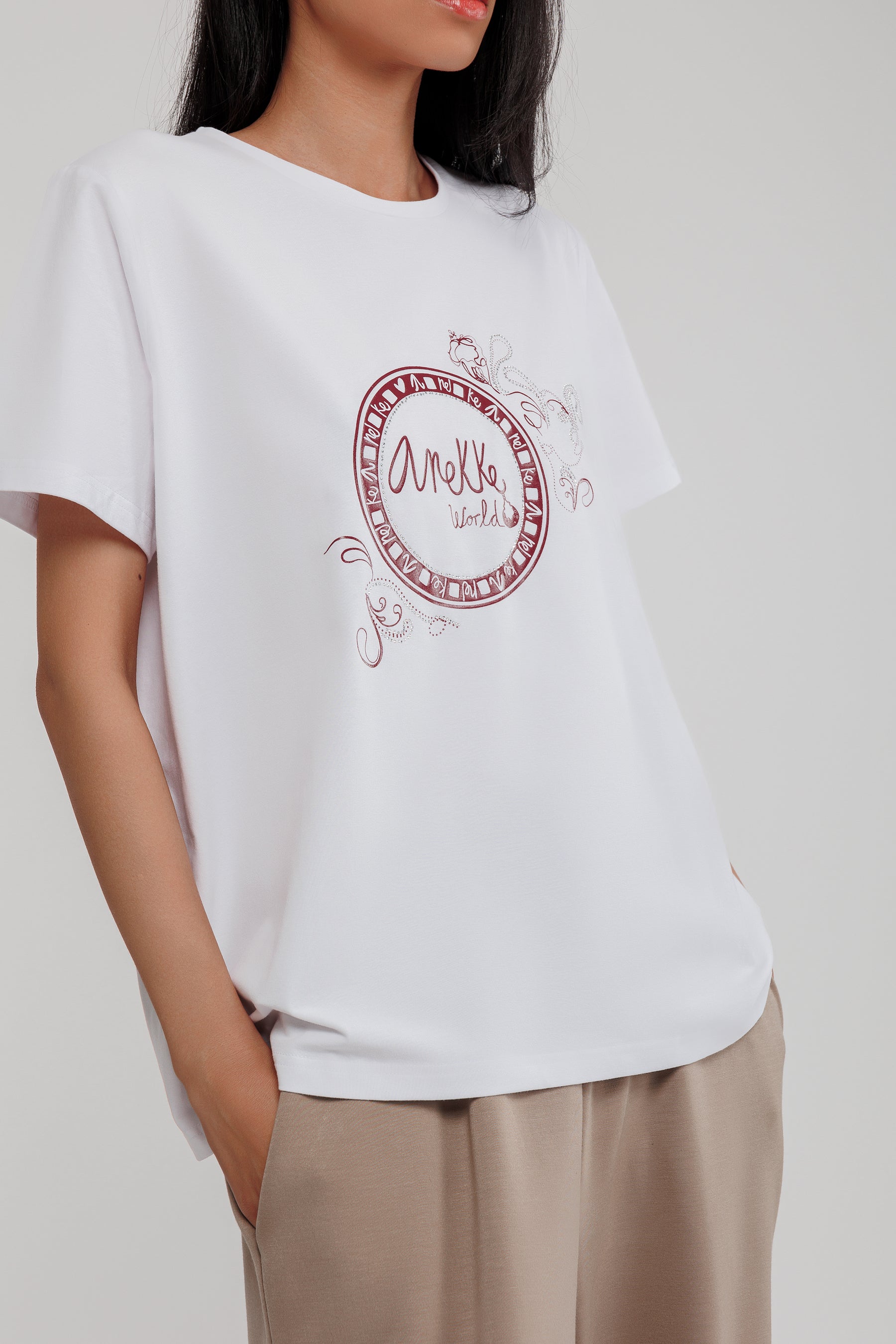 T-shirt à manches courtes blanc et application argentée