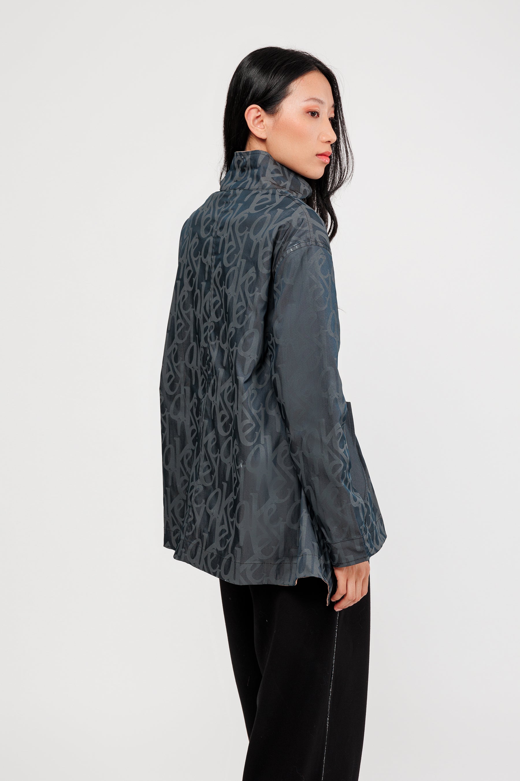 Veste réversible noir et beige