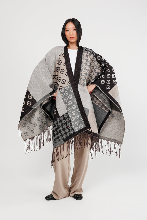 Poncho à franges noir et beige