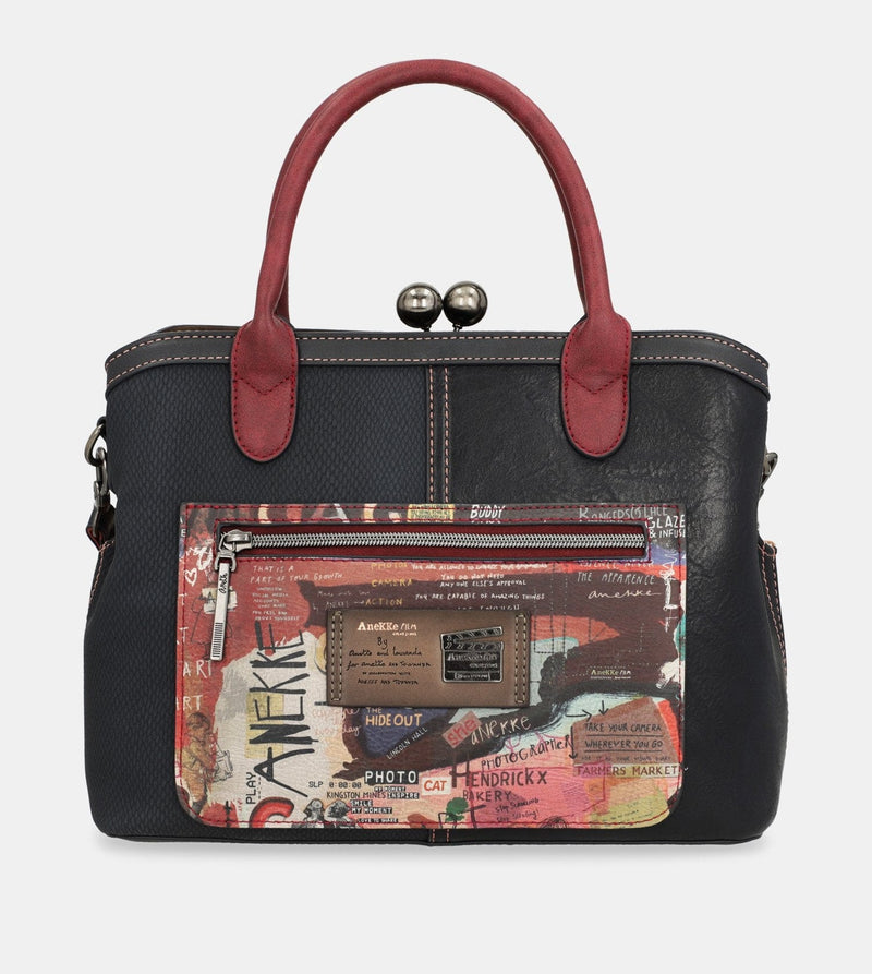 Sac à main de l'art de la ville avec une fermeture de serrure de baiser
