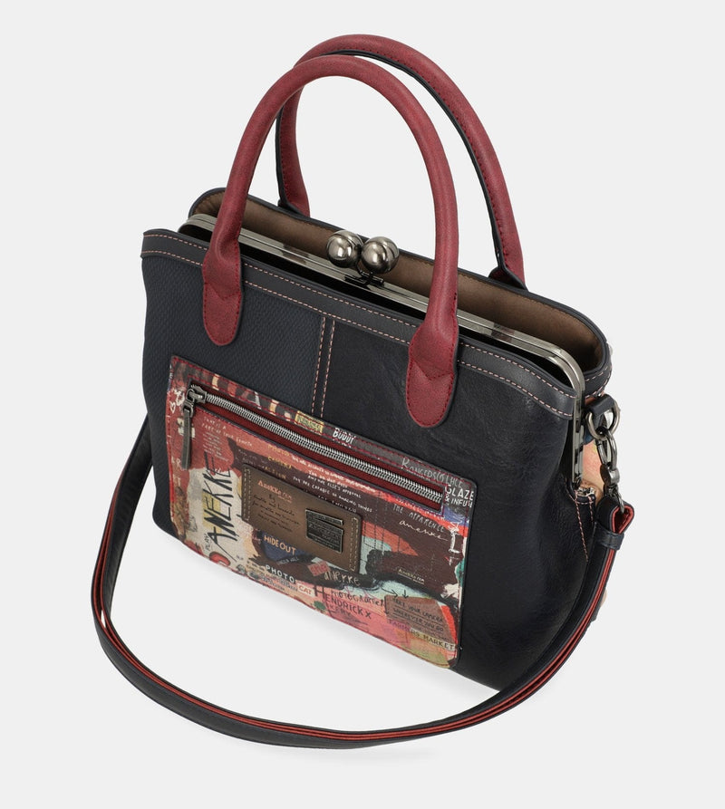 Sac à main de l'art de la ville avec une fermeture de serrure de baiser