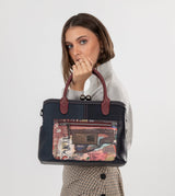 Sac à main de l'art de la ville avec une fermeture de serrure de baiser